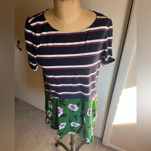 Unique spin on a short sleeve tee. Pretty flowers paired with a striped top